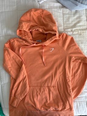 Gymshark Peach-Orange Pullover Hoodie with White Logo